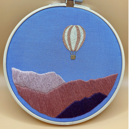 Art by Catherine Young: Balloon Soaring Over Sandia Mountains